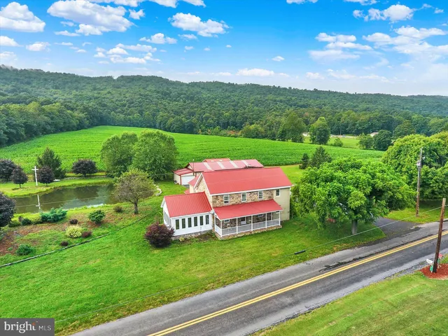 a view of a play house with a yard