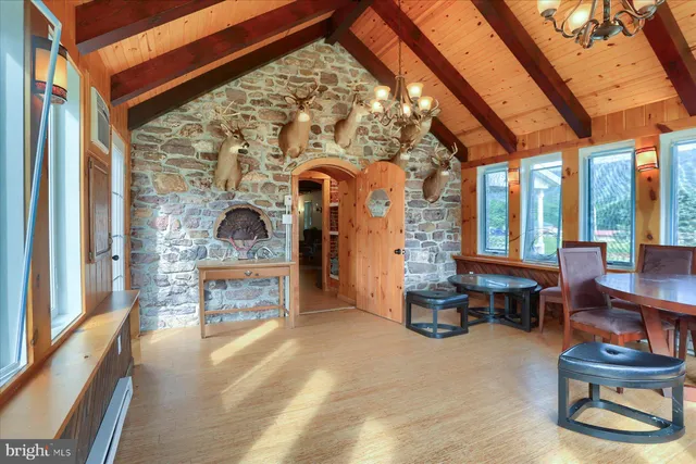 a bathroom with a toilet sink and tub