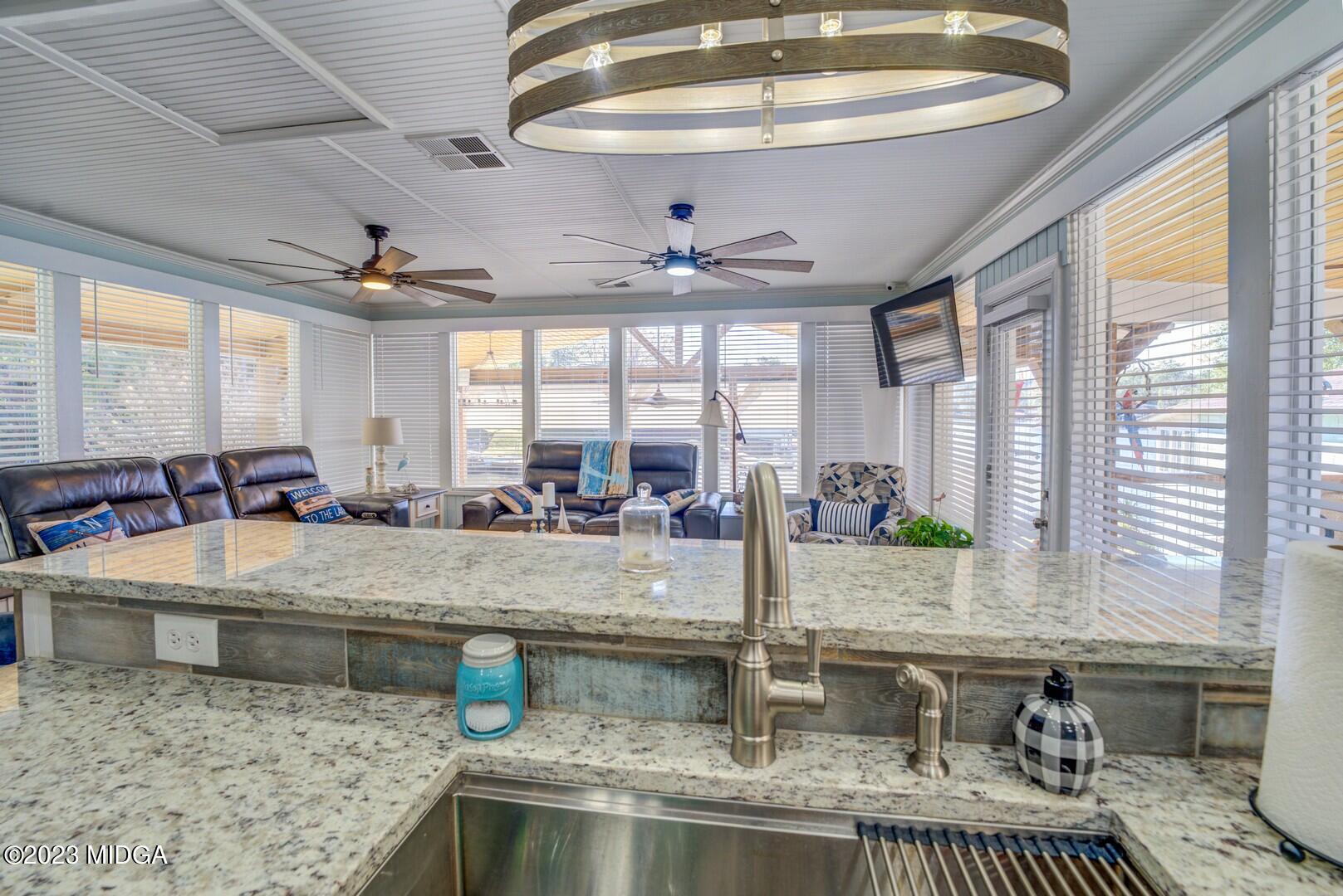 385 Alcovy Road Mansfield, GA 30055 - Photo 11 of 29 385 Alcovy Road - Kitchen to Family Room