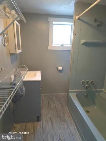 a bathroom with a sink and a vanity