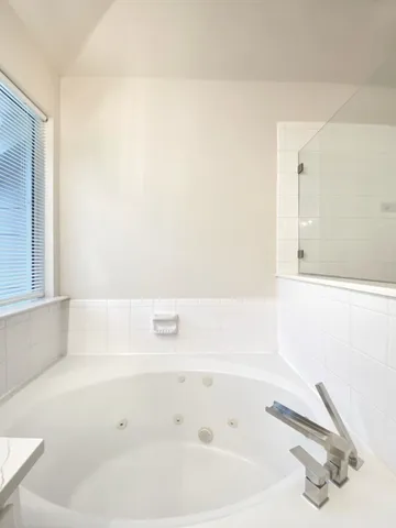 a bathroom with a bathtub