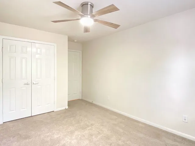 a kitchen with stainless steel appliances a refrigerator sink and microwave