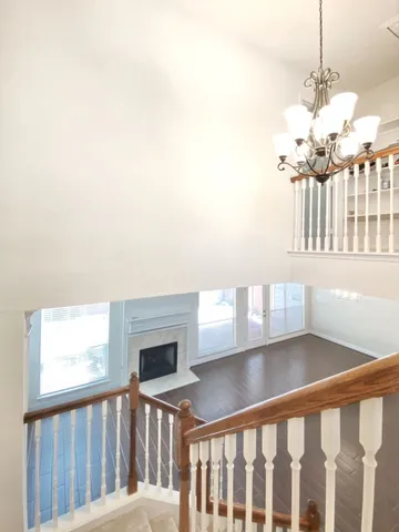 a view of a porch with a floor to ceiling windows