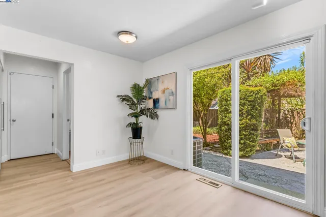 a view of entryway with wooden floor