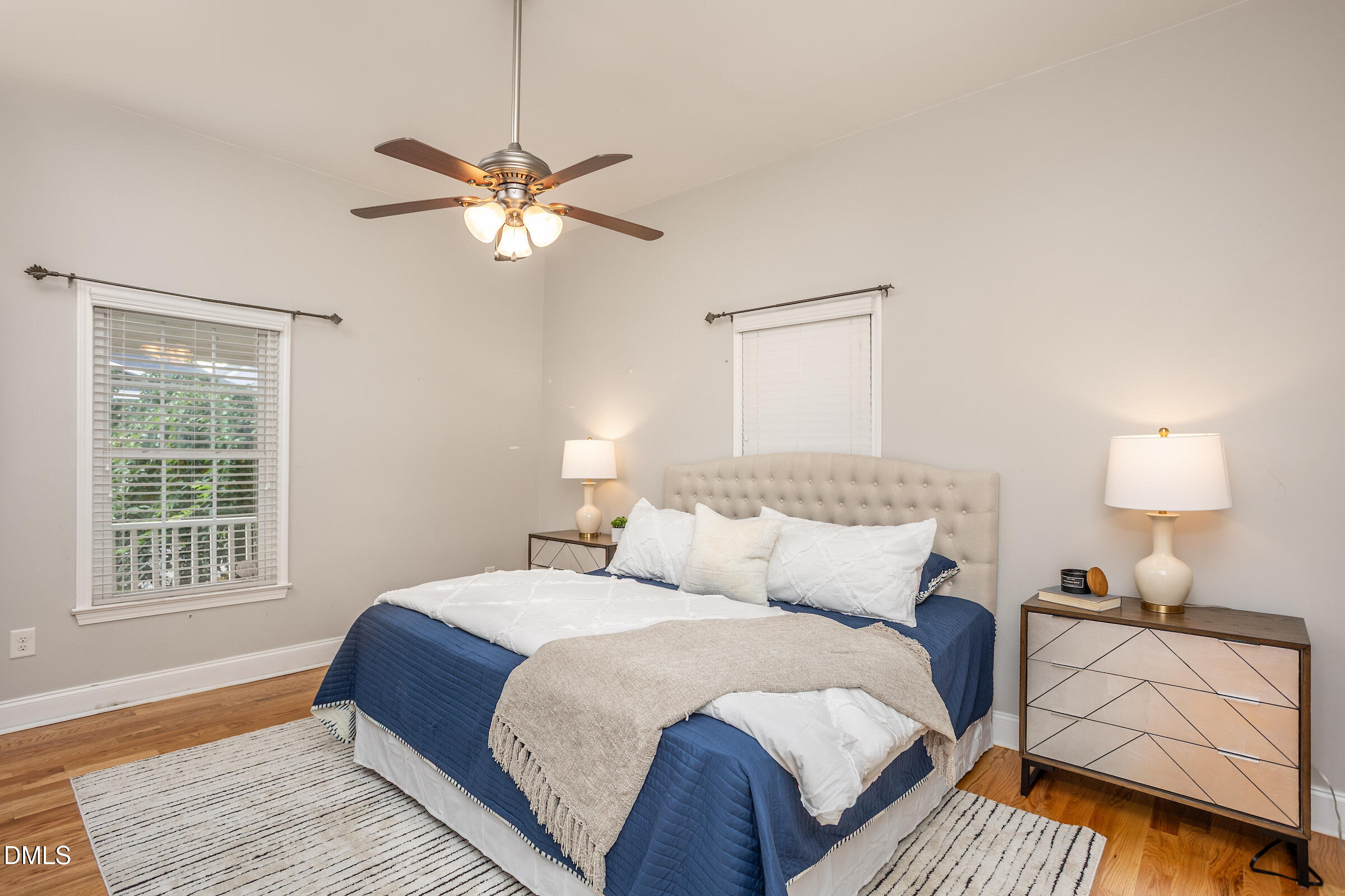 305 Freeman Street Raleigh, NC 27601 - Photo 3 of 15 a bedroom with a bed and a window