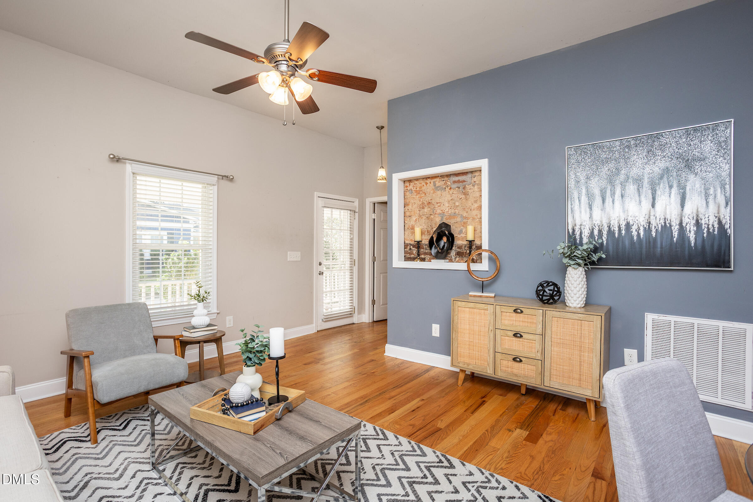 305 Freeman Street Raleigh, NC 27601 - Photo 4 of 15 a living room with furniture and window