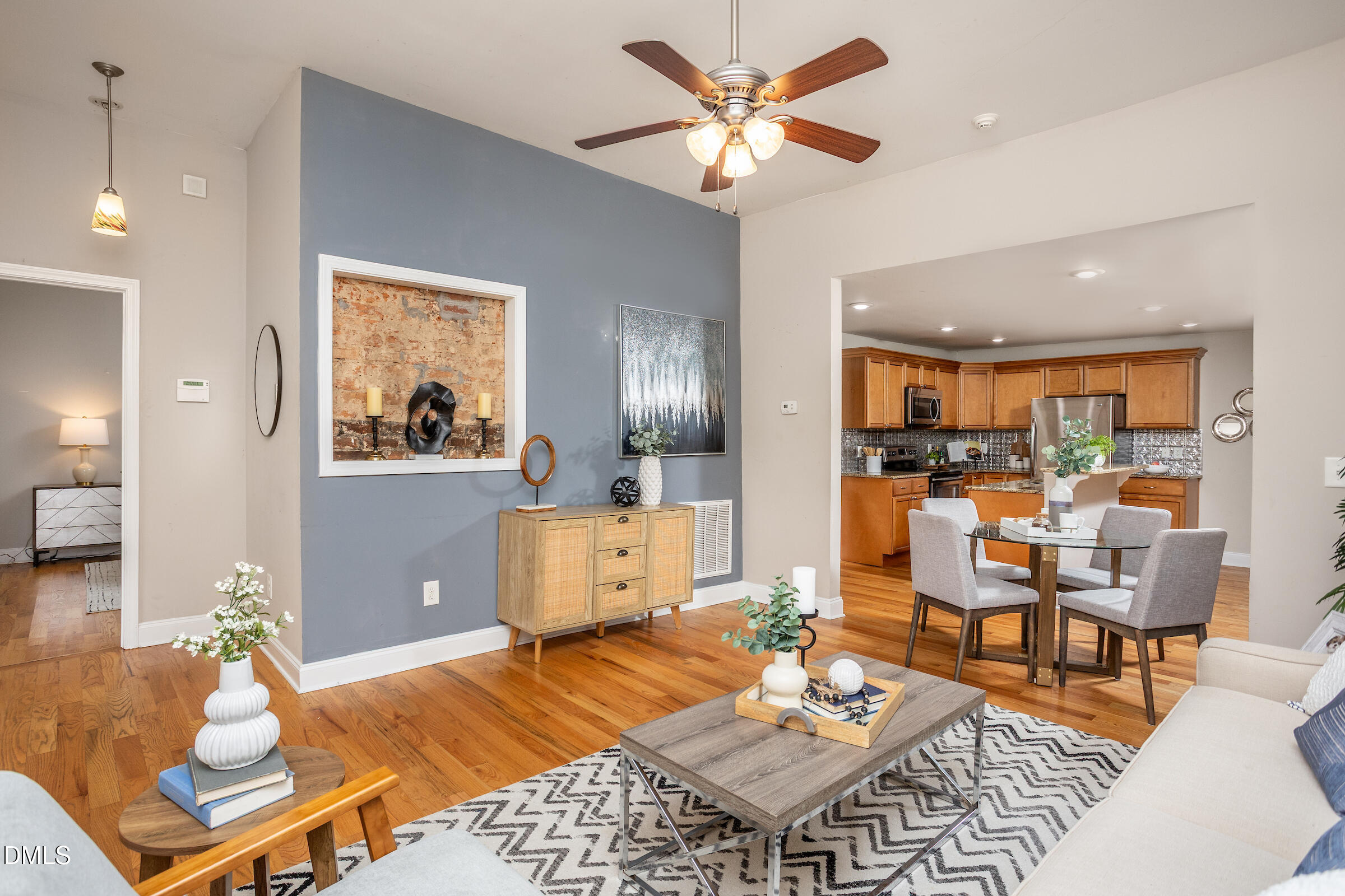 305 Freeman Street Raleigh, NC 27601 - Photo 5 of 15 a living room with furniture and view of kitchen