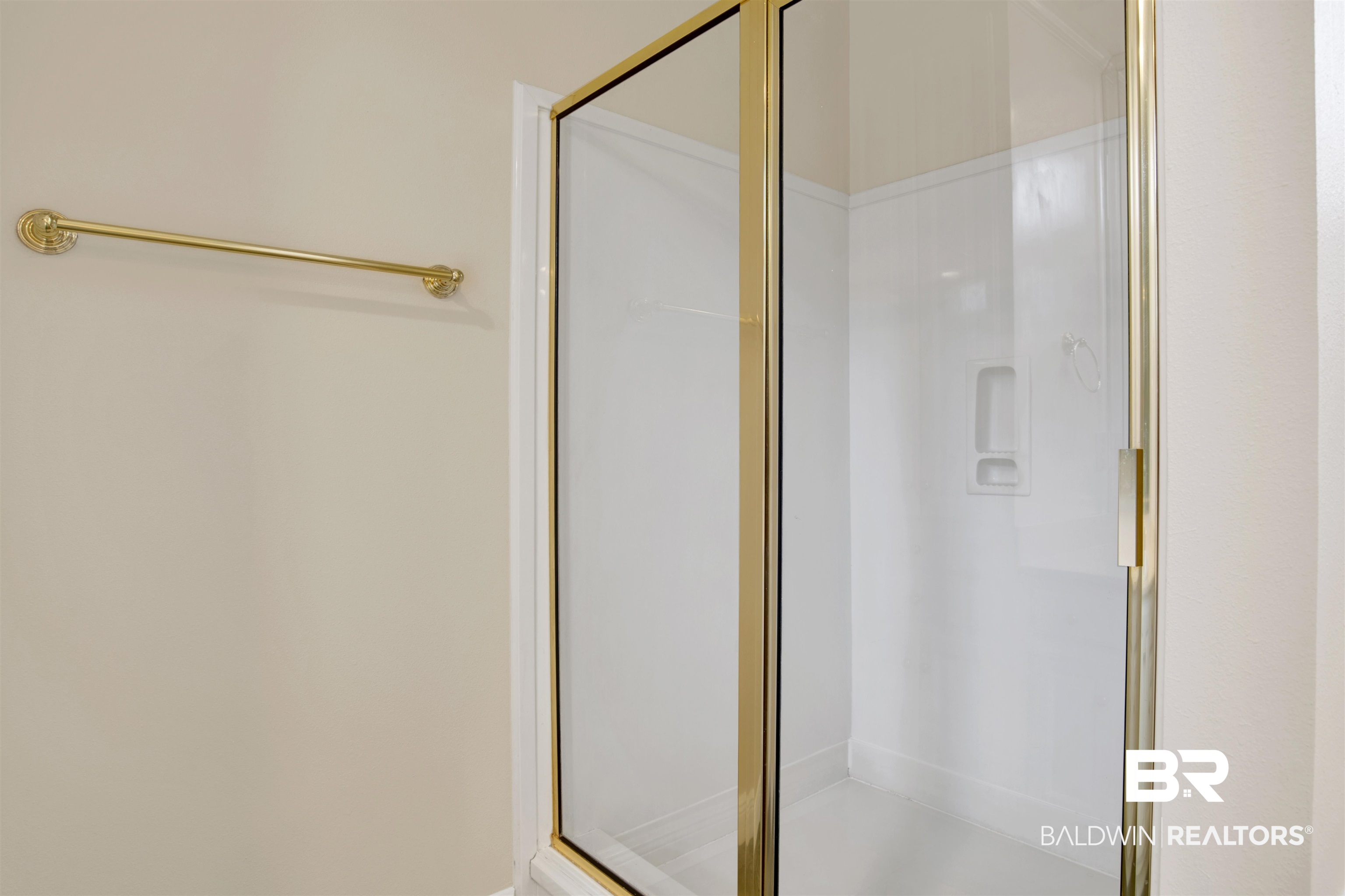 8847 Dawes Lake Road South Mobile, AL 36619 - Photo 21 of 47 Shower enclosure with gold-toned frame and clear glass door