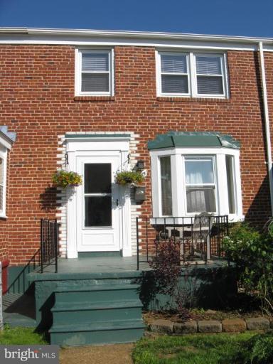 1925 Frames Road Dundalk, MD 21222 - Photo 1 of 14 a front view of a house with plants