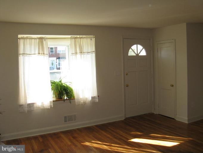 1925 Frames Road Dundalk, MD 21222 - Photo 5 of 14 a view of empty room with window