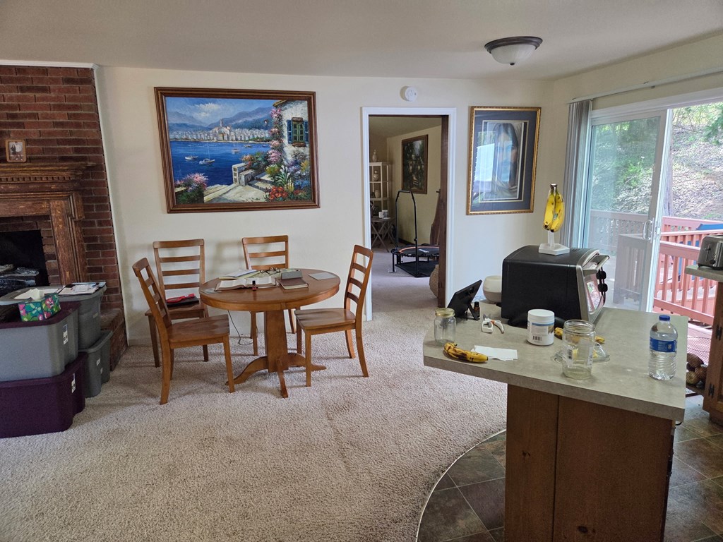 208 Ledford Chapel Road Hayesville, NC 28904 - Photo 11 of 35 a dining room with furniture and window