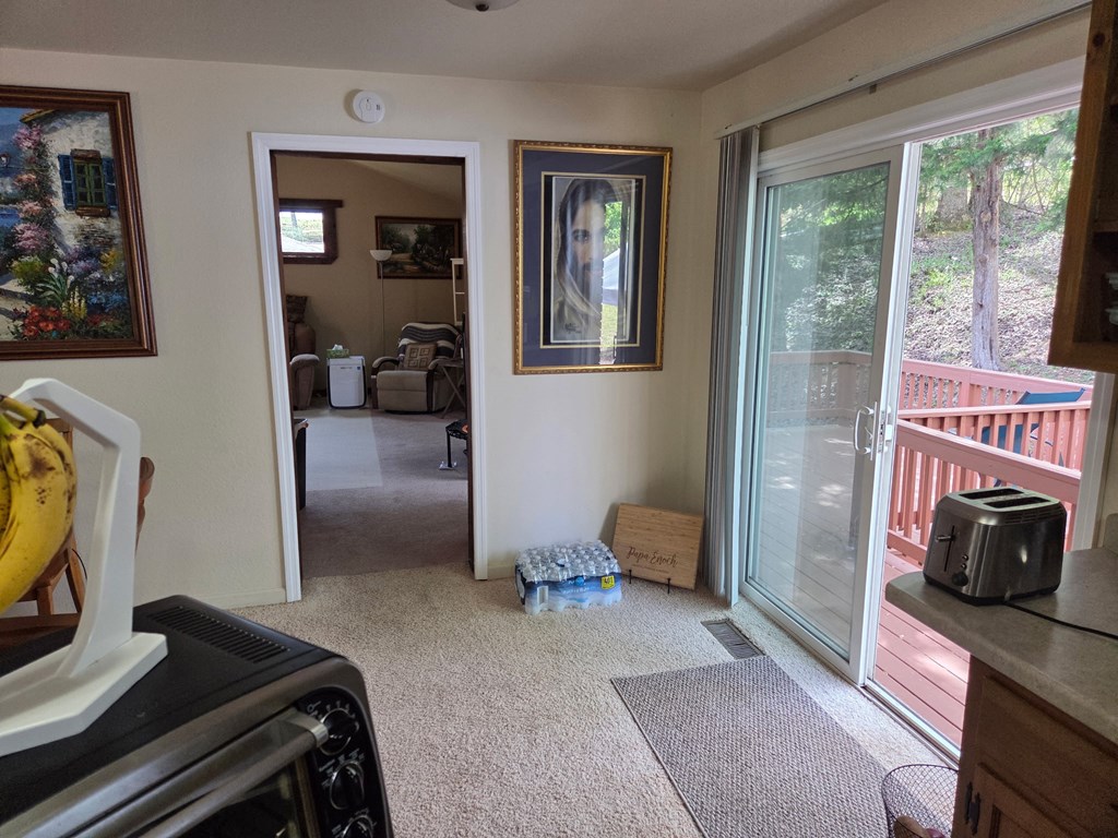 208 Ledford Chapel Road Hayesville, NC 28904 - Photo 13 of 35 a view of living room with furniture and a window