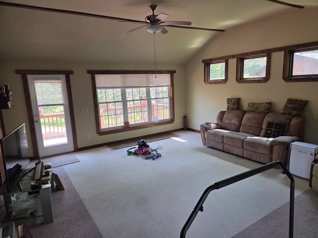 208 Ledford Chapel Road Hayesville, NC 28904 - Photo 16 of 35 a living room with furniture and a flat screen tv