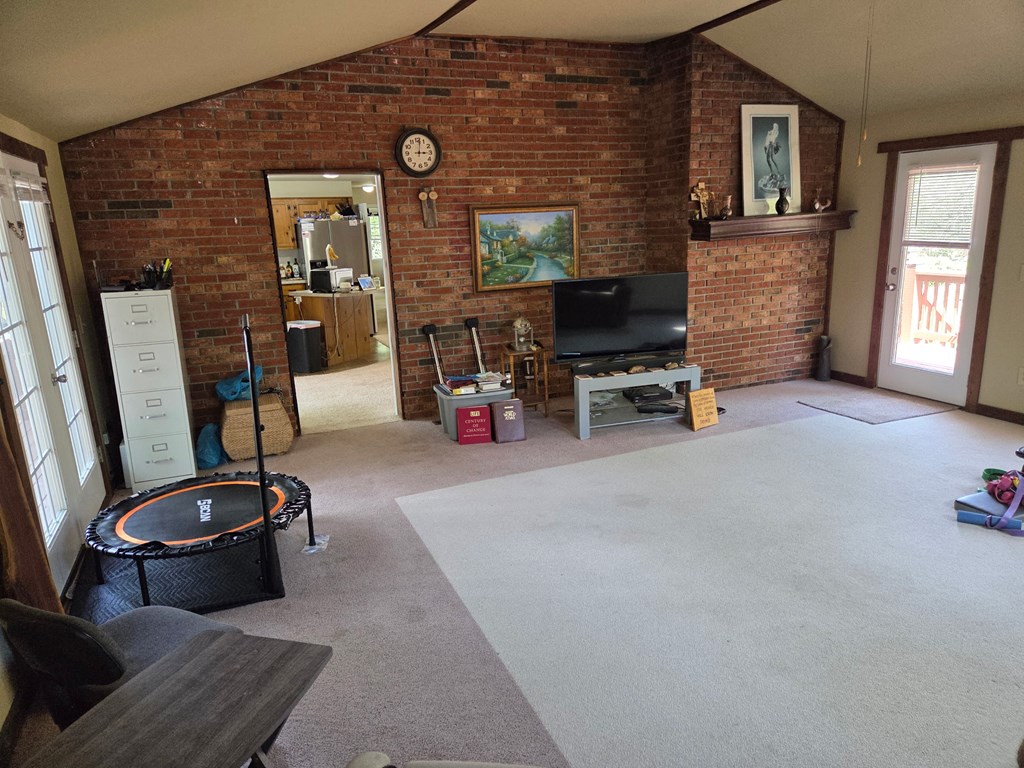 208 Ledford Chapel Road Hayesville, NC 28904 - Photo 18 of 35 a living room with furniture and a flat screen tv