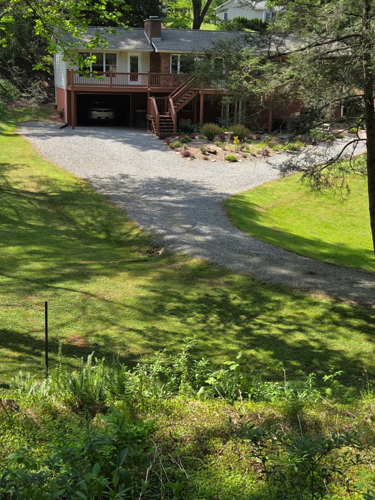 208 Ledford Chapel Road Hayesville, NC 28904 - Photo 21 of 35 a swimming pool with some trees in the background