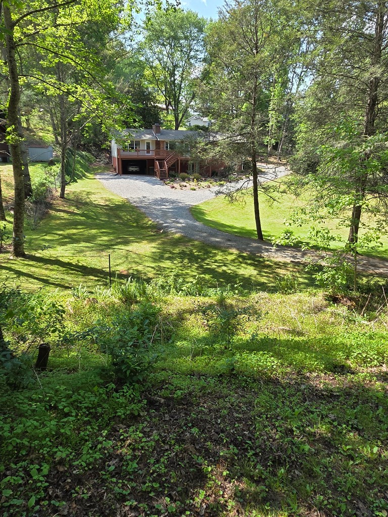 208 Ledford Chapel Road Hayesville, NC 28904 - Photo 22 of 35 a view of a yard with a house
