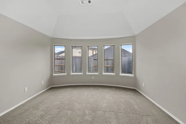 an empty room with windows