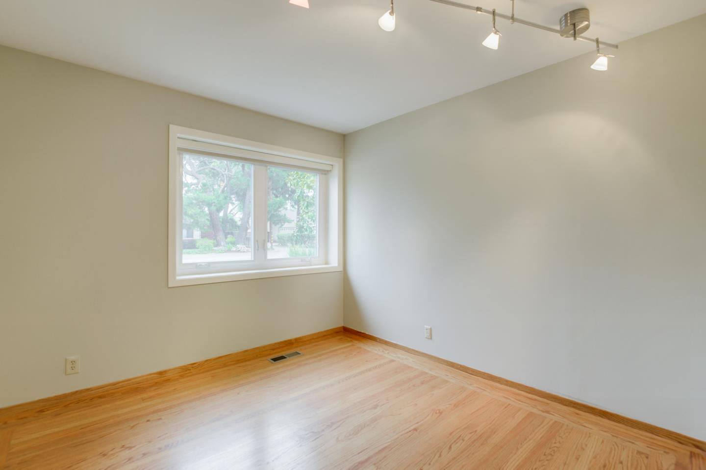 390 Cherry Avenue Los Altos, CA 94022 - Photo 11 of 27 an empty room with a window