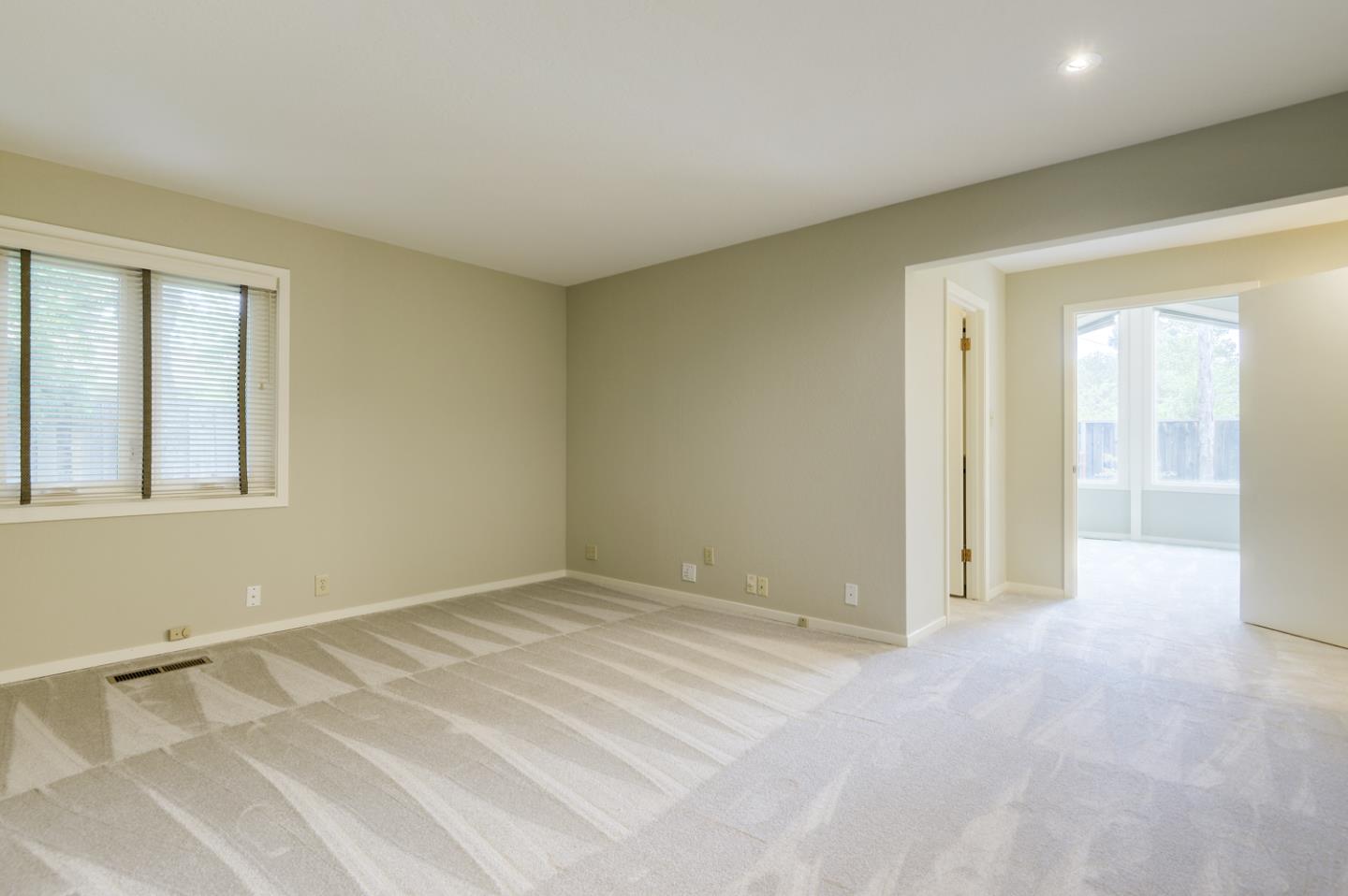 390 Cherry Avenue Los Altos, CA 94022 - Photo 13 of 27 a view of an empty room with a window
