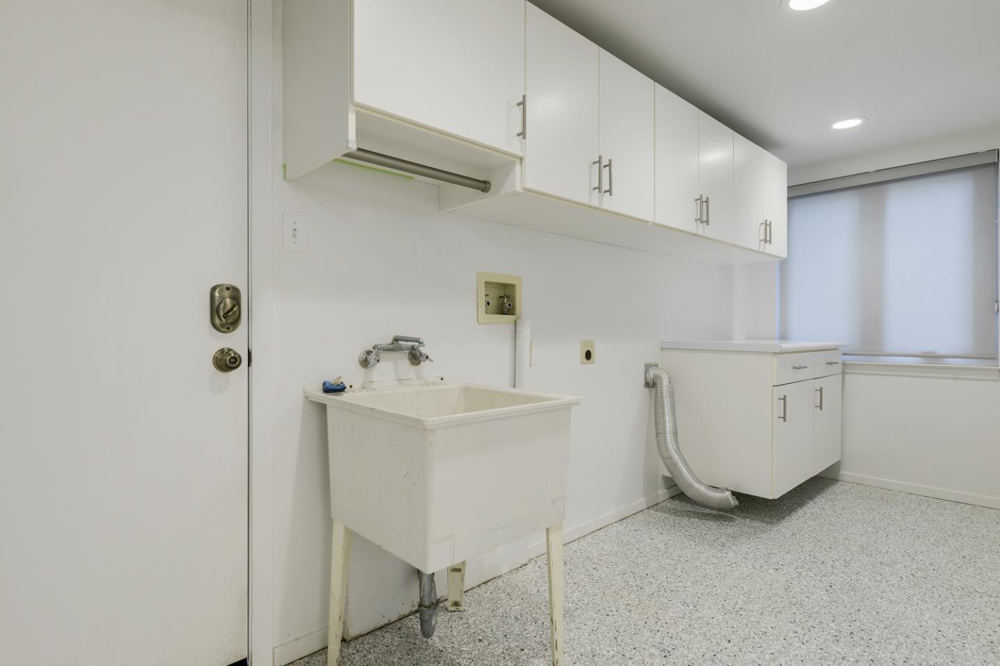 390 Cherry Avenue Los Altos, CA 94022 - Photo 19 of 27 a view of a kitchen with white cabinets