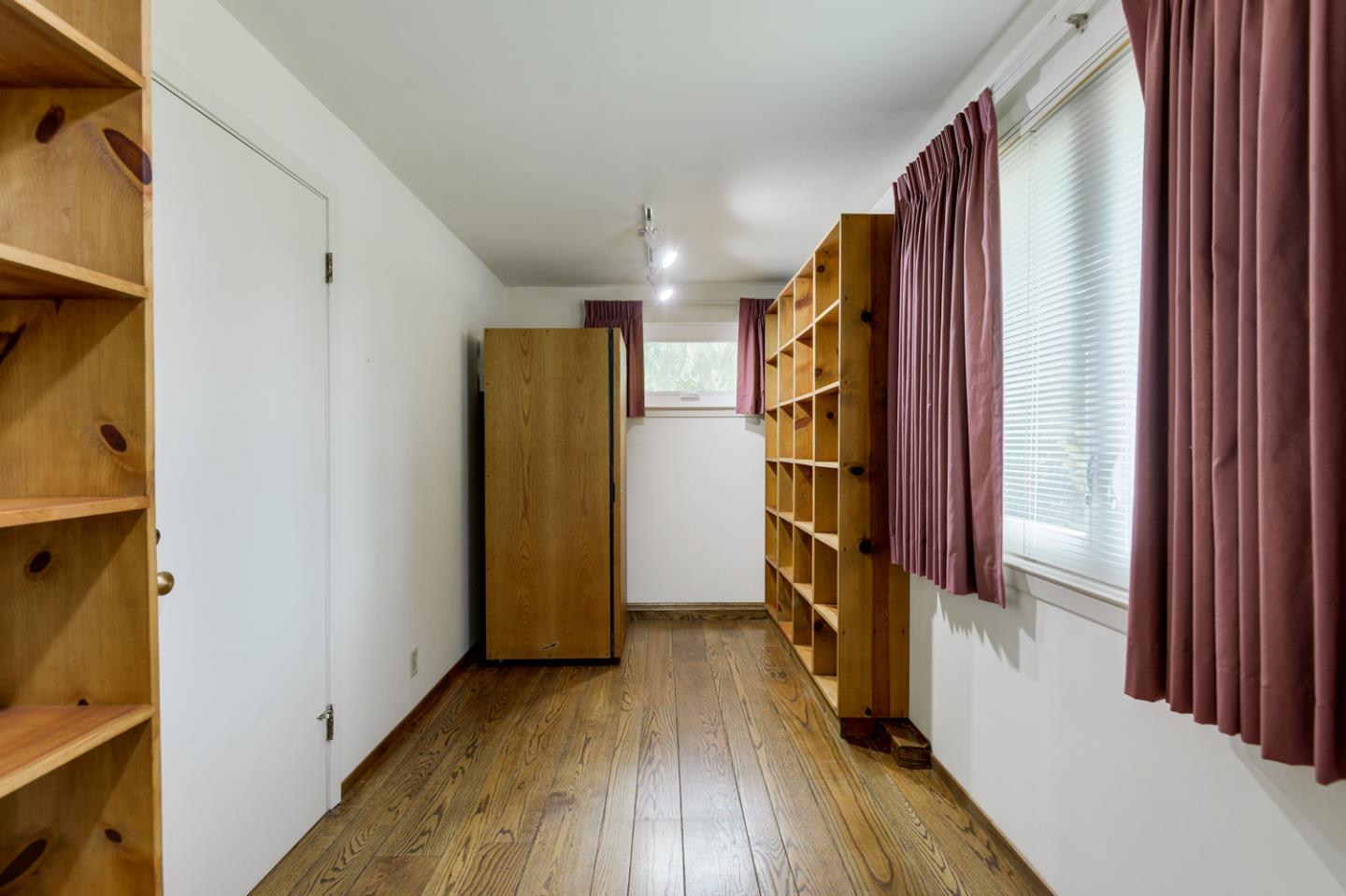 390 Cherry Avenue Los Altos, CA 94022 - Photo 20 of 27 a view of hallway with stairs and wooden floor