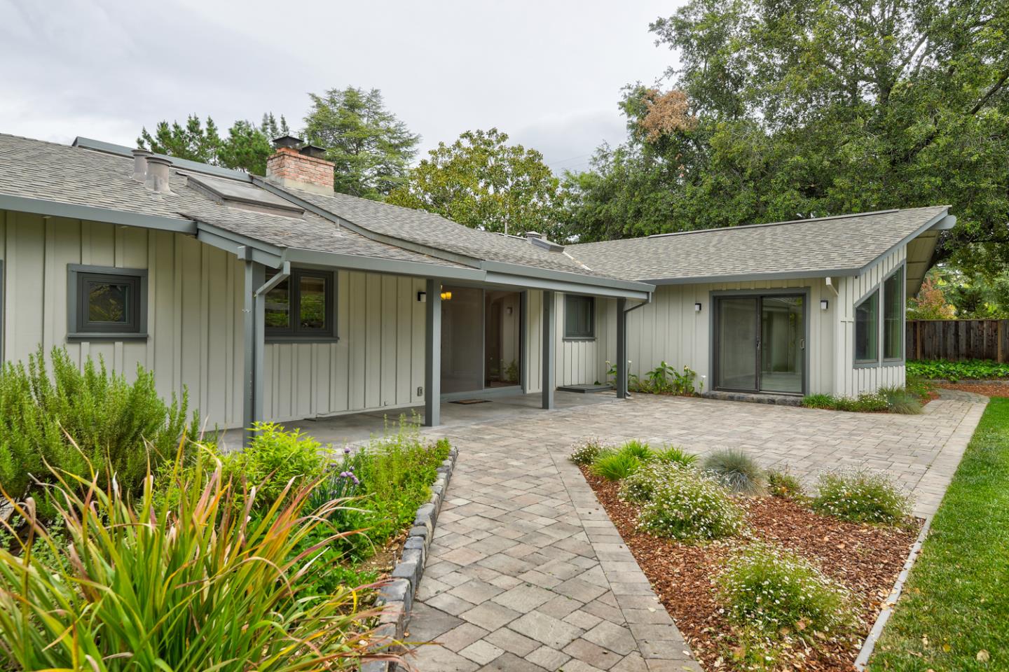 390 Cherry Avenue Los Altos, CA 94022 - Photo 24 of 27 a front view of a house with a garden