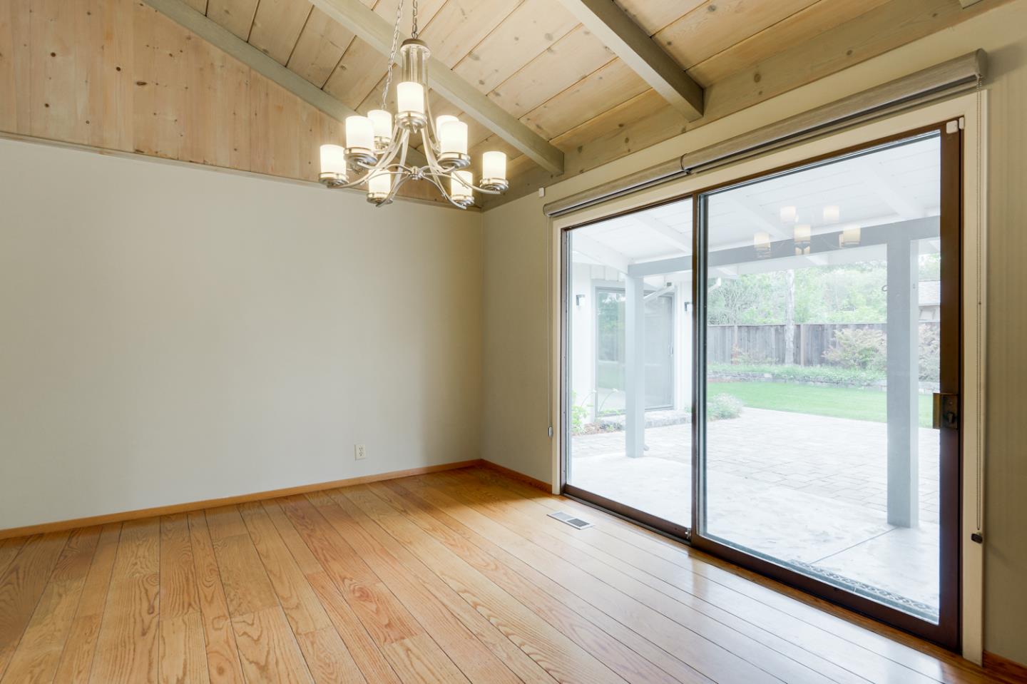390 Cherry Avenue Los Altos, CA 94022 - Photo 4 of 27 a view of empty room with wooden floor and fan