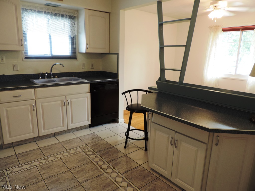 435 Center Road Bedford, OH 44146 - Photo 8 of 25 Custom Kitchen opens to the Formal Dining Room...perfect for entertaining.