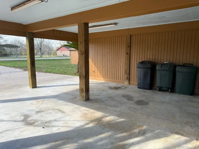a view of an empty room with a balcony