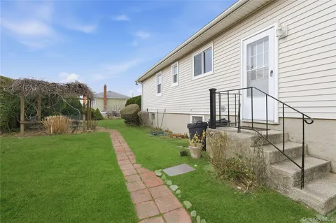 a house view with a garden space