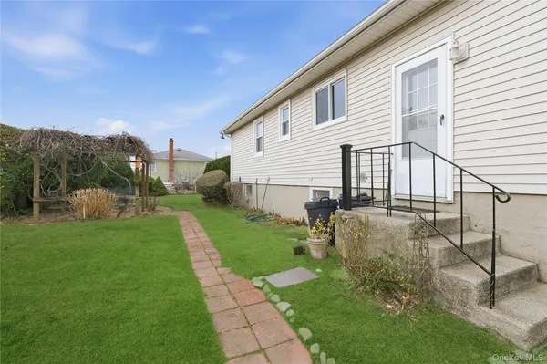 a house view with a garden space