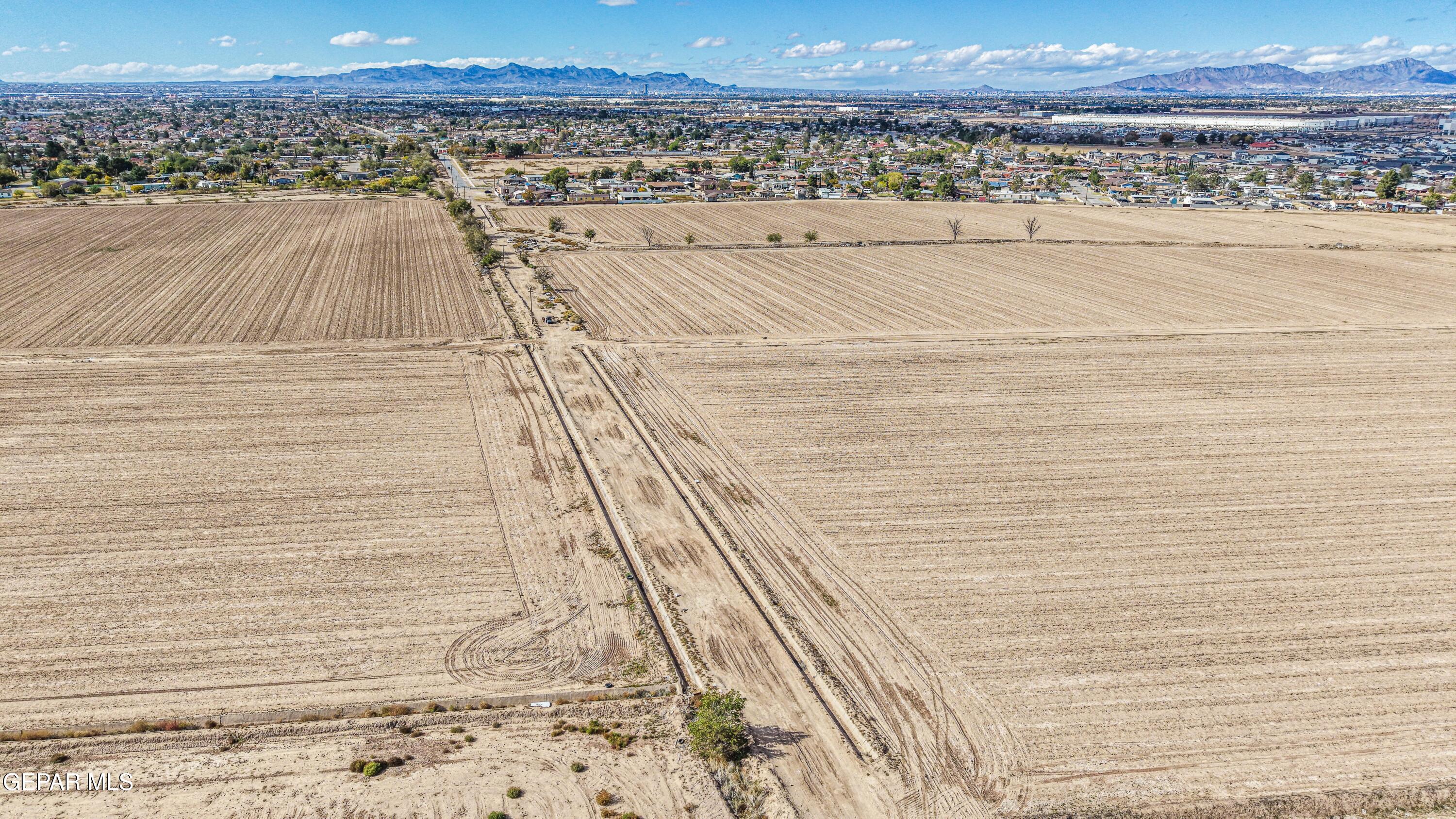 Tbd North Moon Road Socorro, TX 79927 - Photo 28 of 30 a view of a terrace with wooden floor and a building