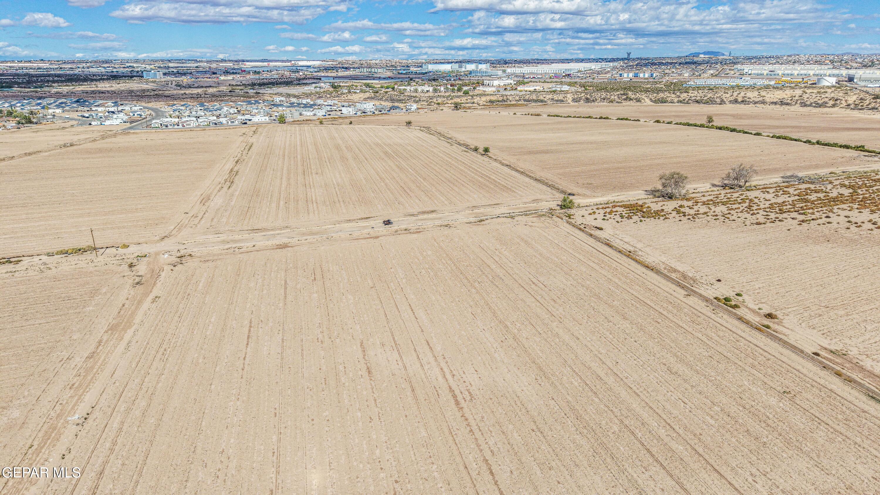 Tbd North Moon Road Socorro, TX 79927 - Photo 30 of 30 a view of an empty room and wooden floor