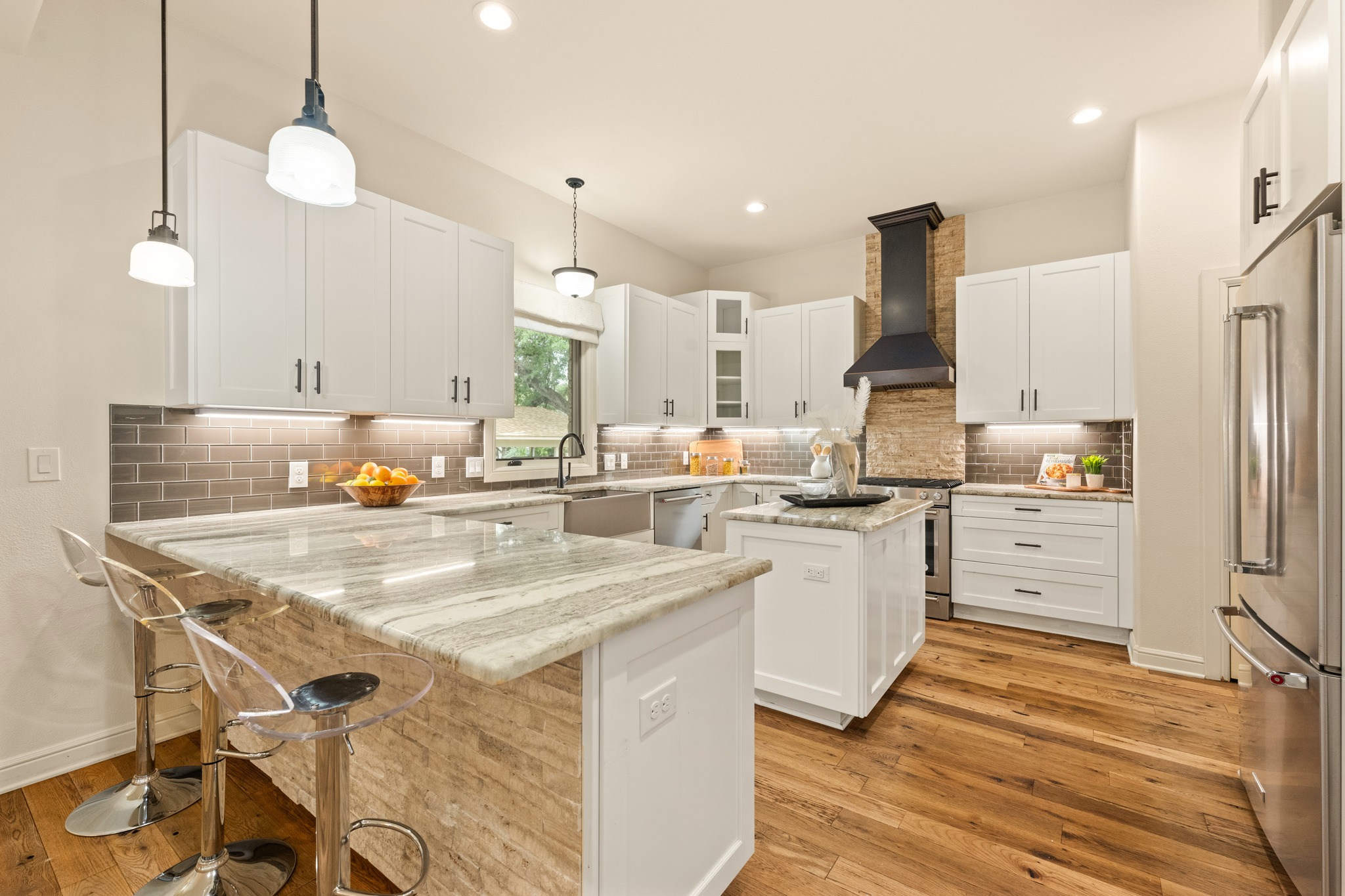 3907 Bailey Lane Austin, TX 78756 - Photo 10 of 40 The generous kitchen will appeal to the chef in the household with gourmet finishes and fixtures, a free flowing layout, and commercial style stainless appliances