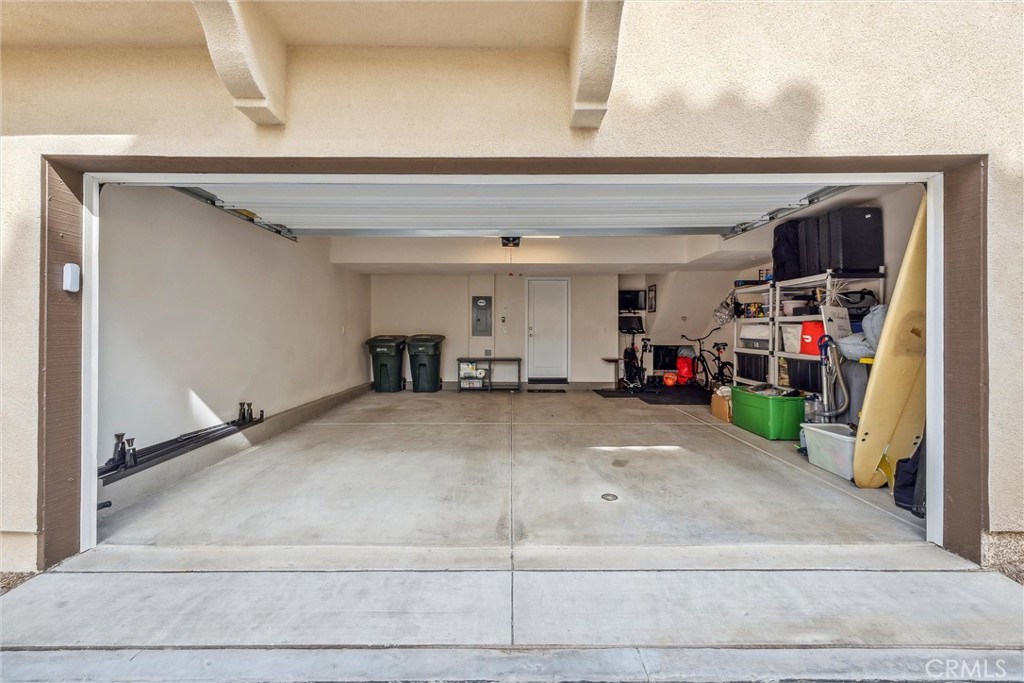318 Ford Road Costa Mesa, CA 92627 - Photo 17 of 20 a living room with furniture and a ceiling fan