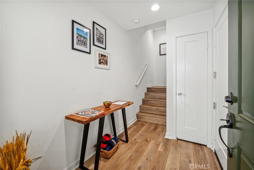 318 Ford Road Costa Mesa, CA 92627 - Photo 3 of 20 a view of entryway with wooden floor