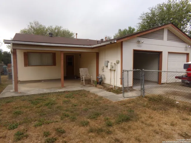 a view of a house with a garage