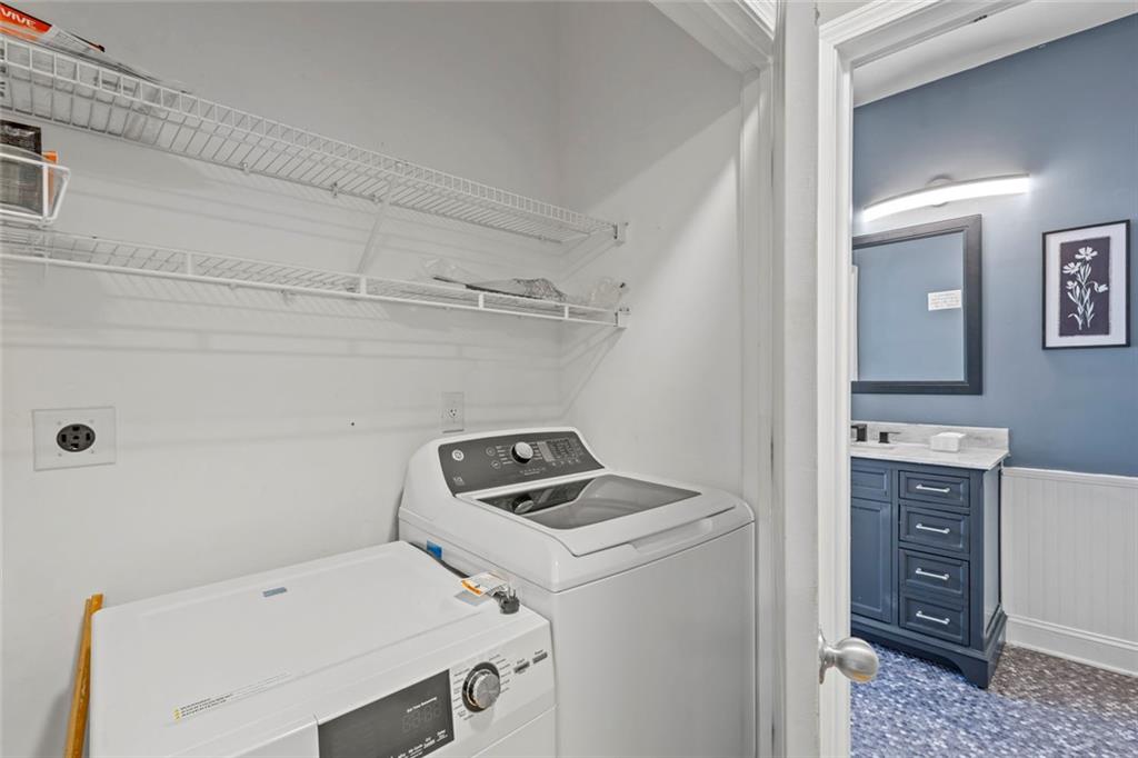 821 Ralph McGill Boulevard Northeast, Unit 3301 Atlanta, GA 30306 - Photo 16 of 31 a utility room with dryer and washer