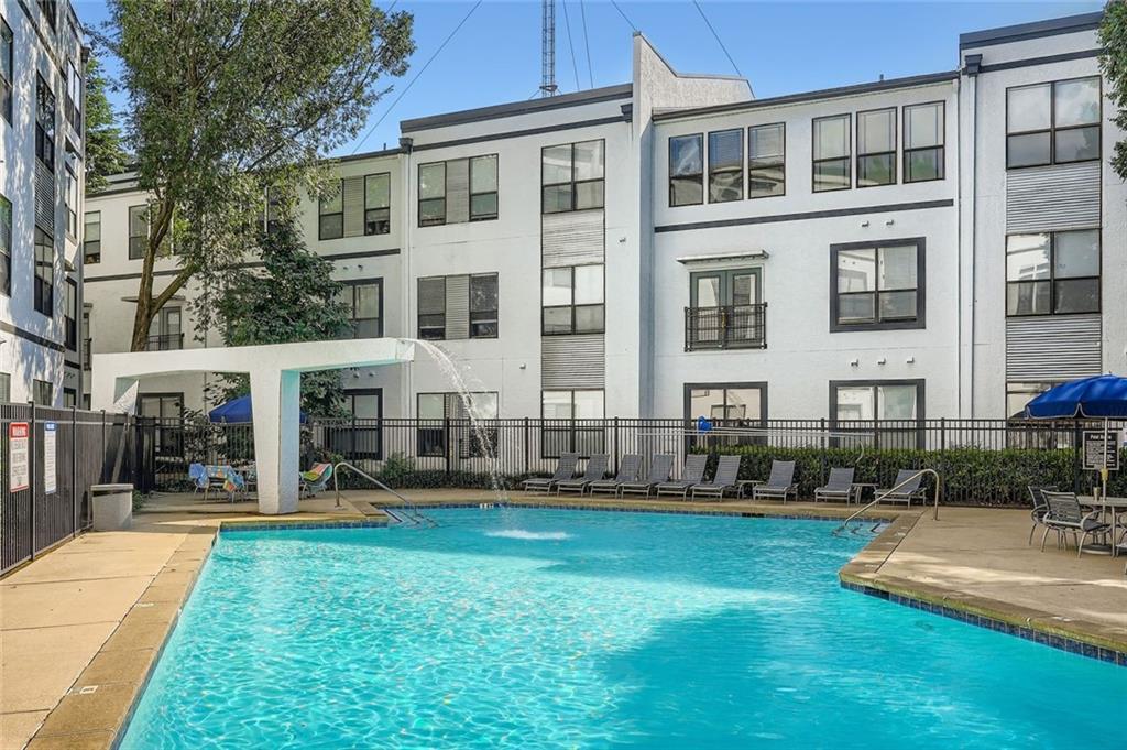 821 Ralph McGill Boulevard Northeast, Unit 3301 Atlanta, GA 30306 - Photo 17 of 31 a front view of building with yard and lots of green space