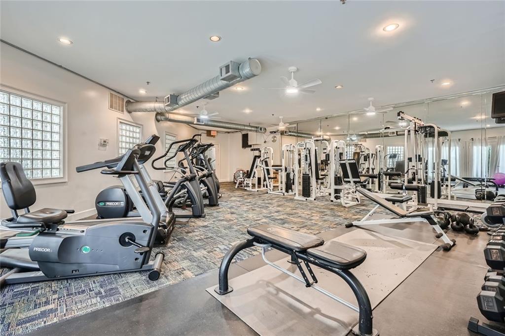 821 Ralph McGill Boulevard Northeast, Unit 3301 Atlanta, GA 30306 - Photo 19 of 31 a view of a room with gym equipment