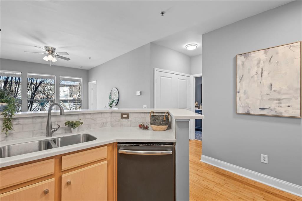 821 Ralph McGill Boulevard Northeast, Unit 3301 Atlanta, GA 30306 - Photo 10 of 31 a kitchen with stainless steel appliances granite countertop a sink stove and cabinets