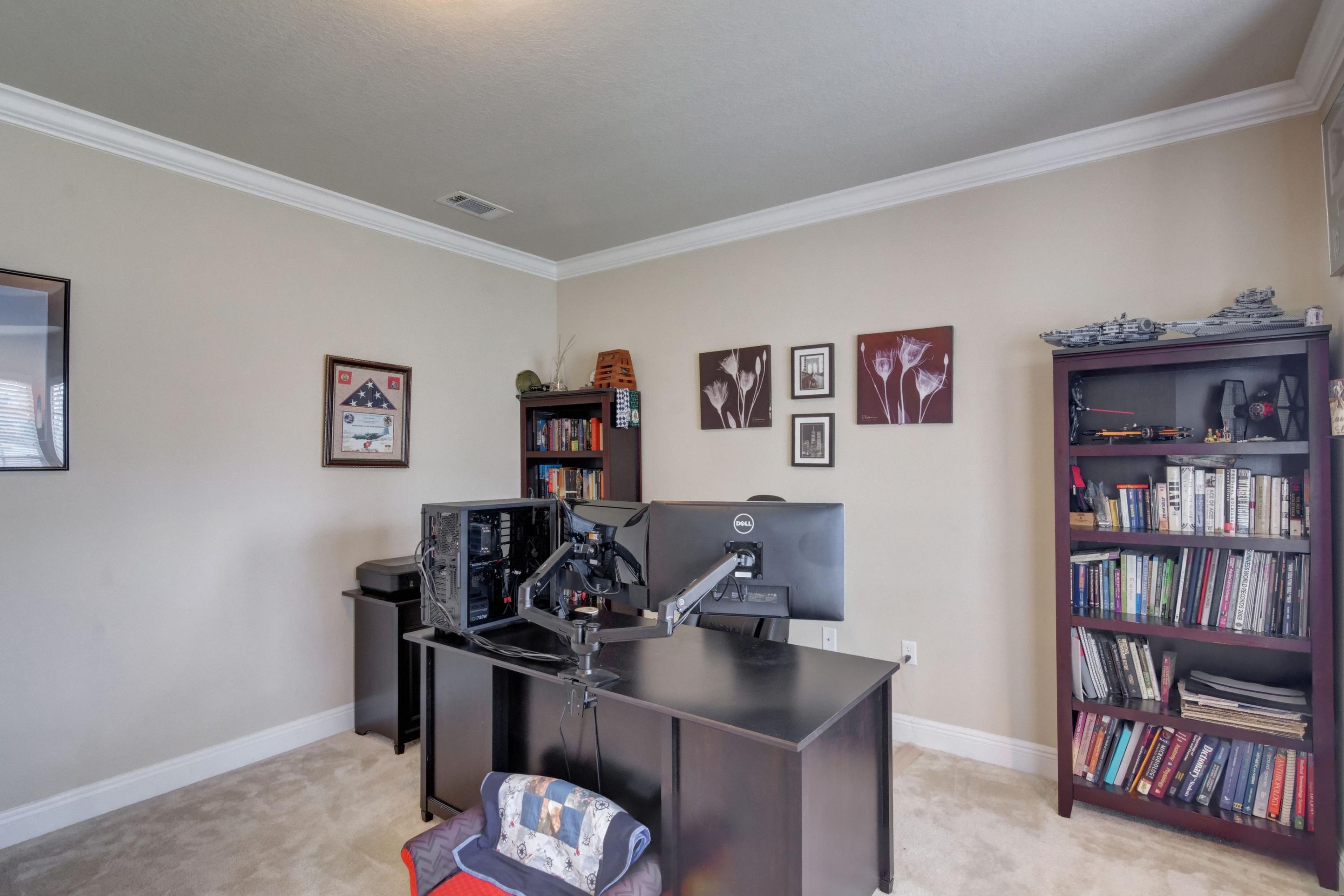 646 Red Fern Road Crestview, FL 32536 - Photo 11 of 64 a view of a workspace with furniture