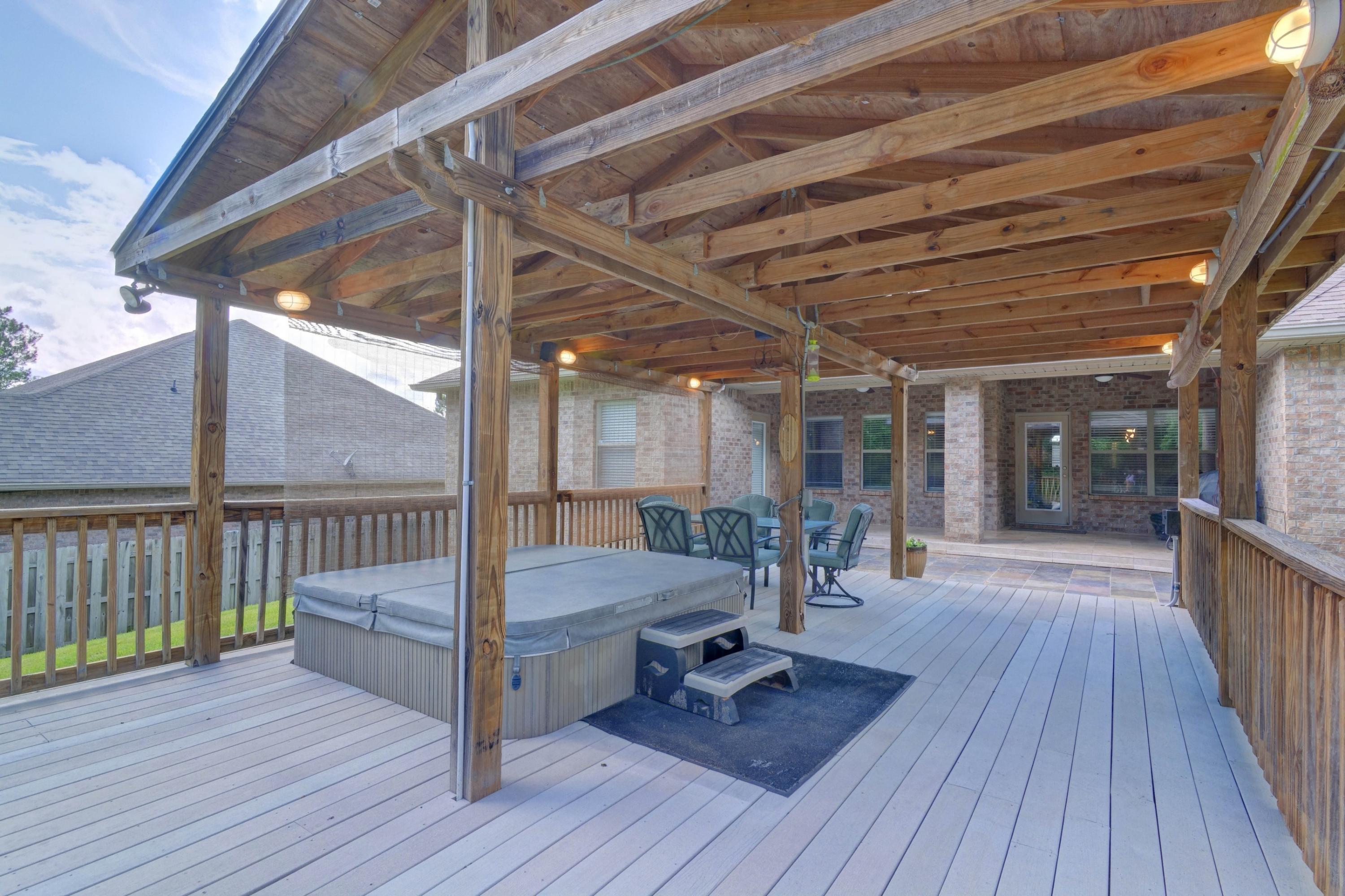 646 Red Fern Road Crestview, FL 32536 - Photo 2 of 64 a view of a patio with wooden floor