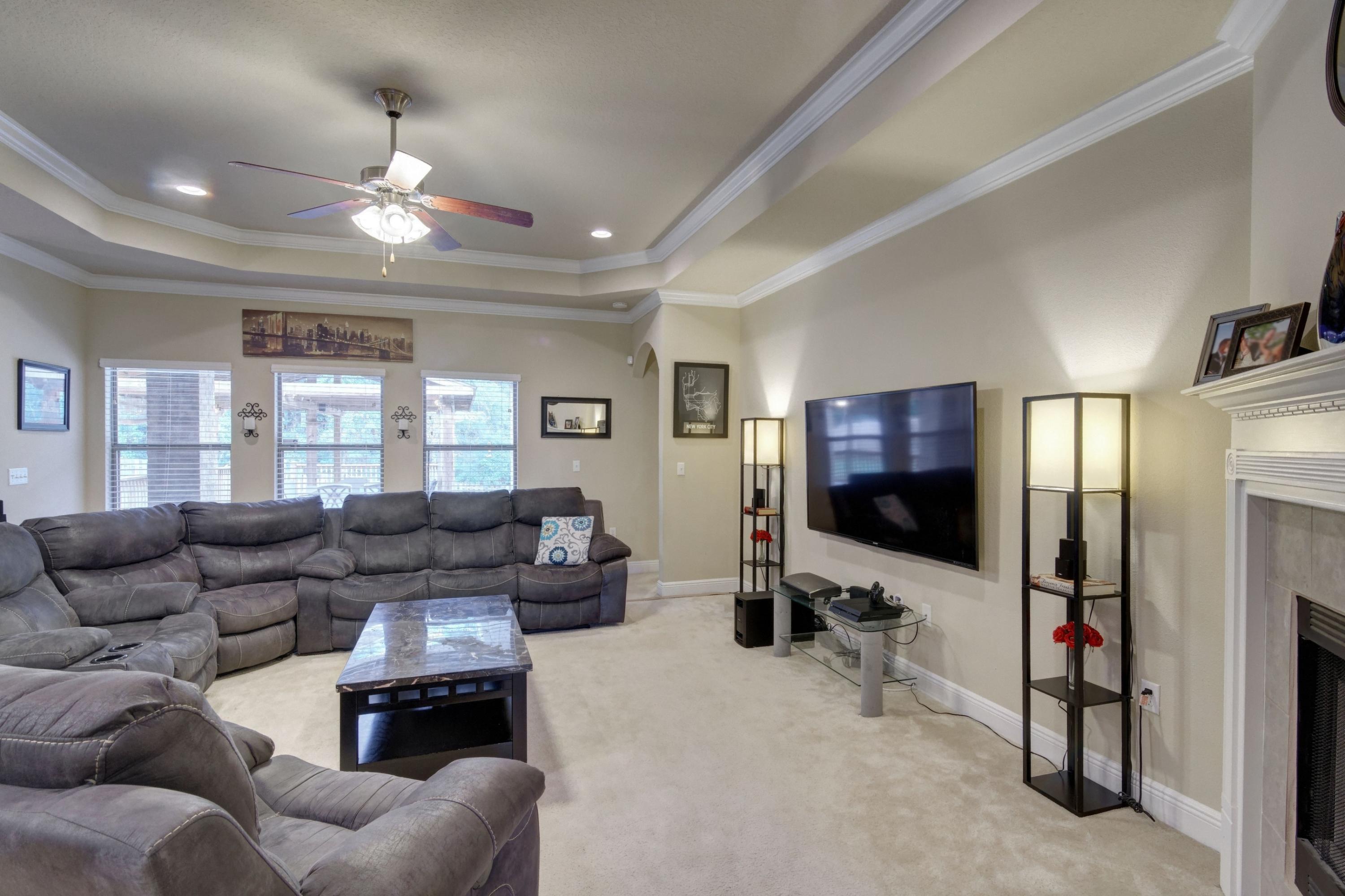 646 Red Fern Road Crestview, FL 32536 - Photo 23 of 64 a living room with furniture and a flat screen tv