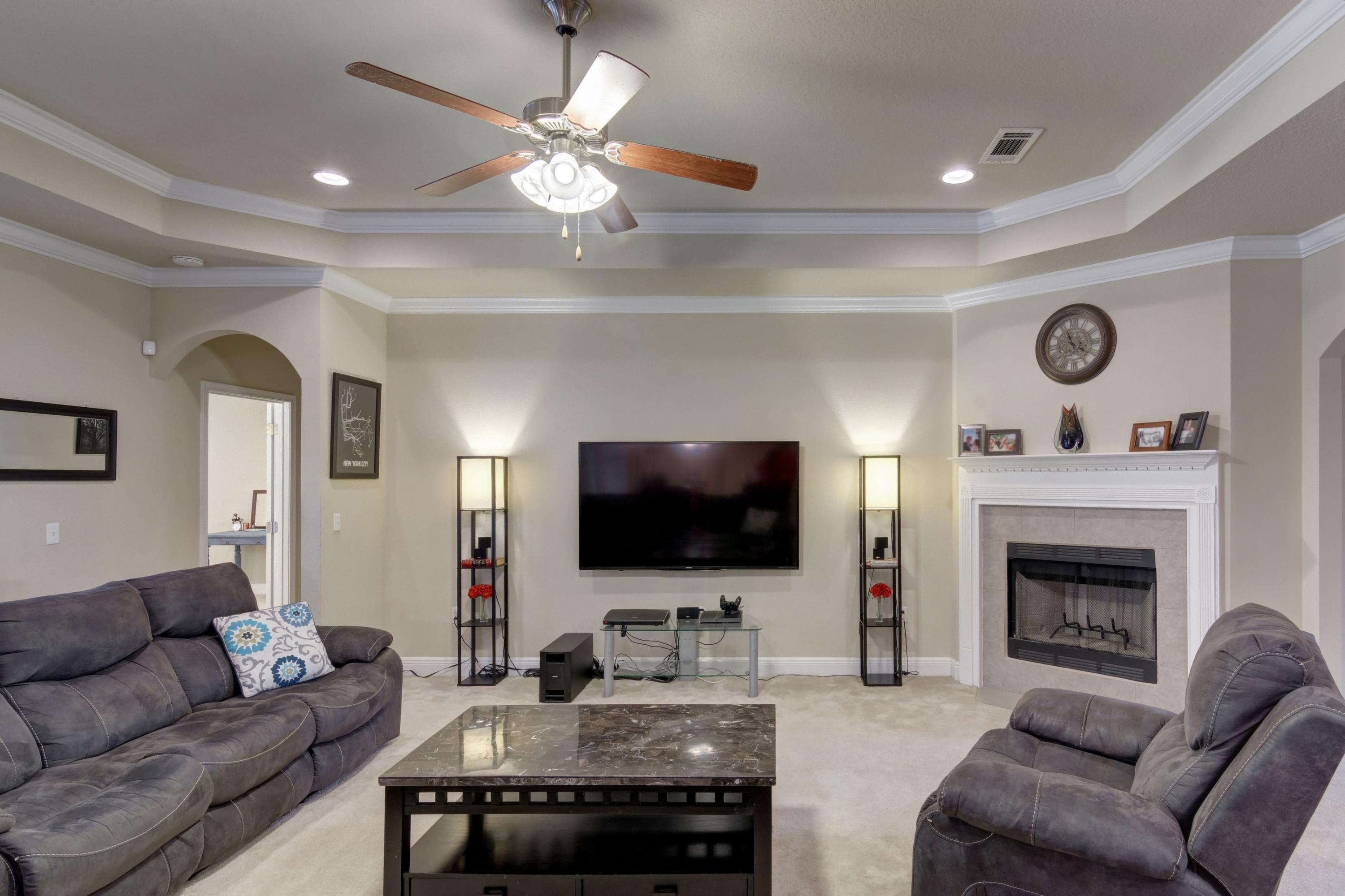 646 Red Fern Road Crestview, FL 32536 - Photo 24 of 64 a living room with furniture and a flat screen tv