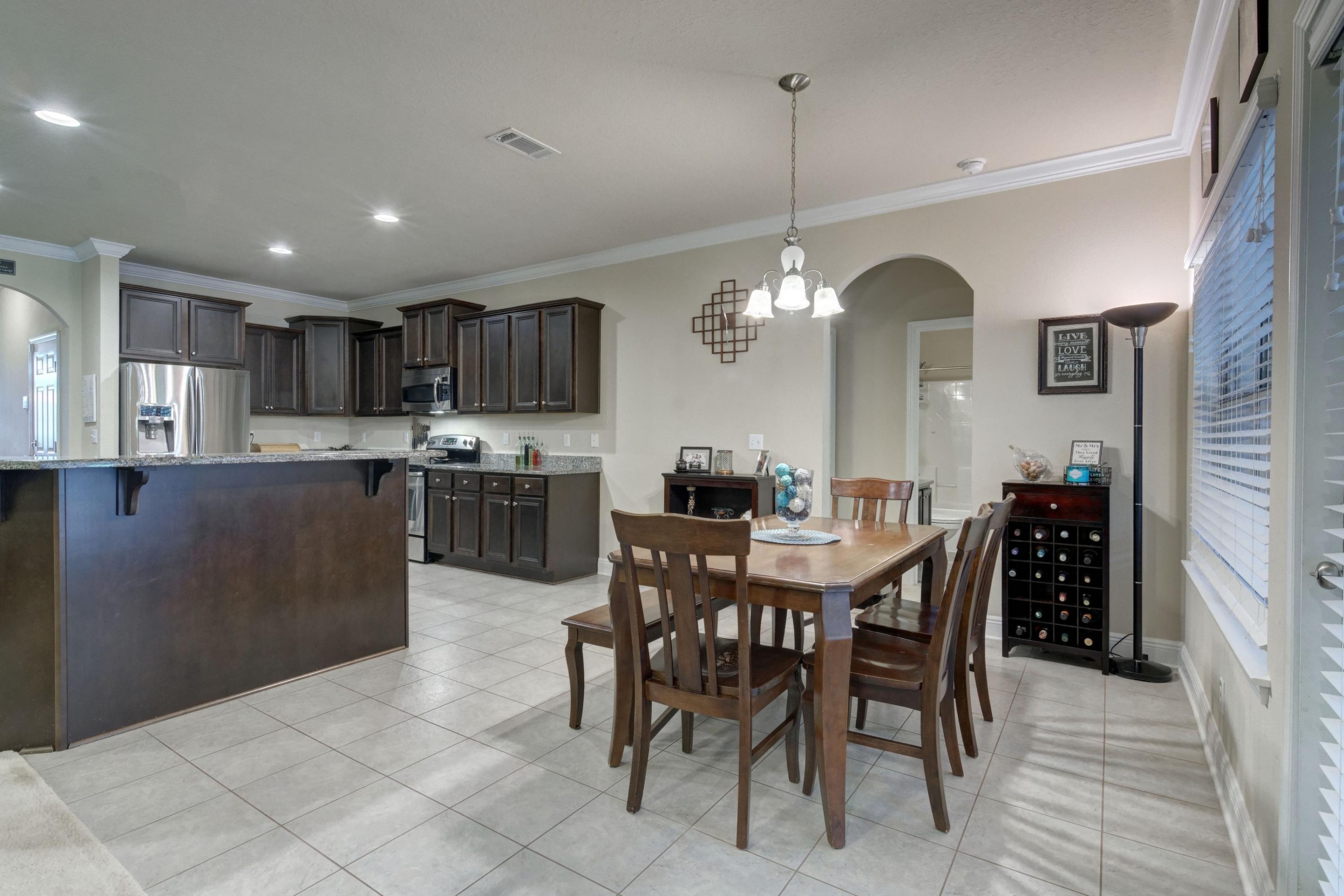 646 Red Fern Road Crestview, FL 32536 - Photo 26 of 64 a view of a dining room with furniture