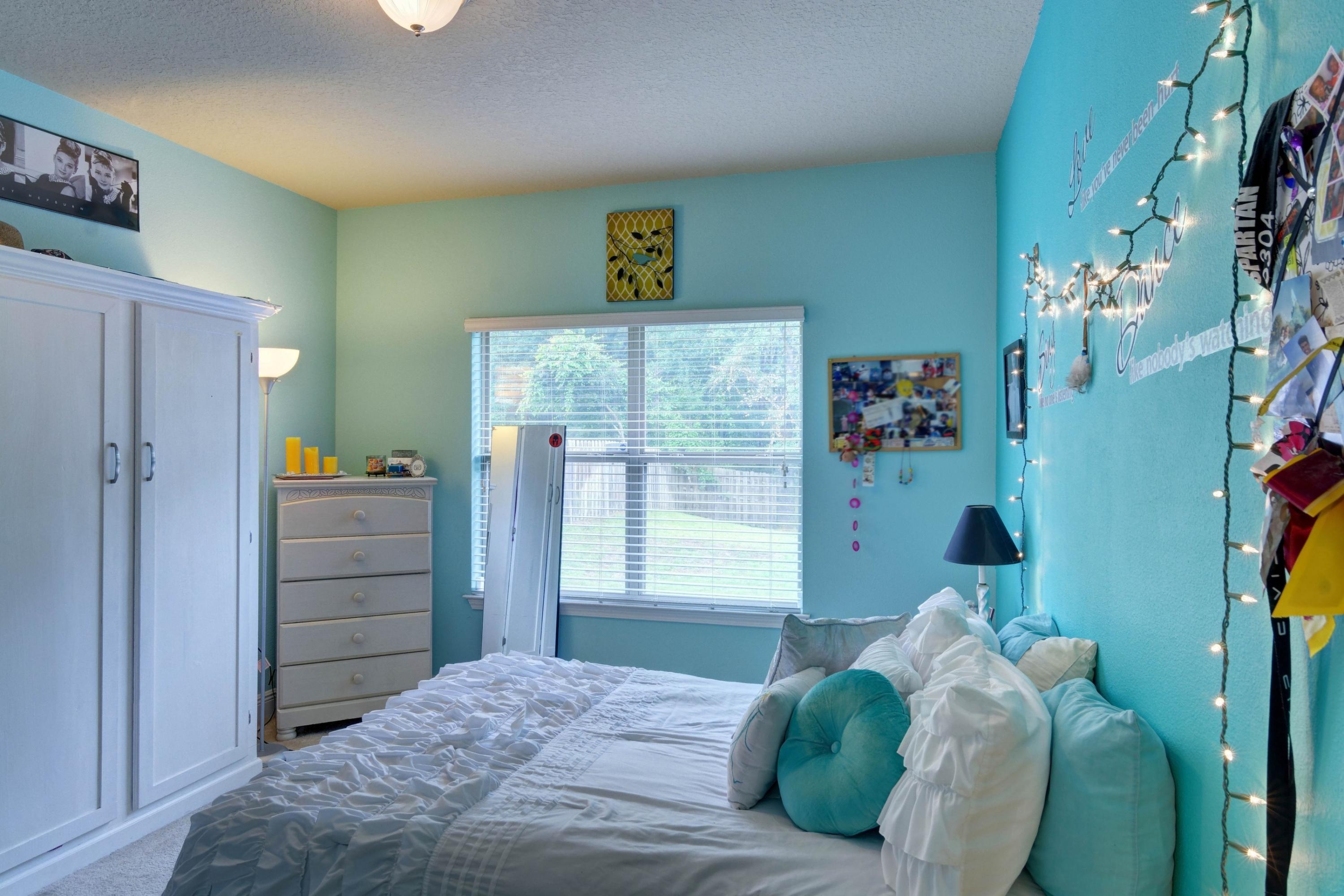 646 Red Fern Road Crestview, FL 32536 - Photo 42 of 64 a bedroom with a bed and a window