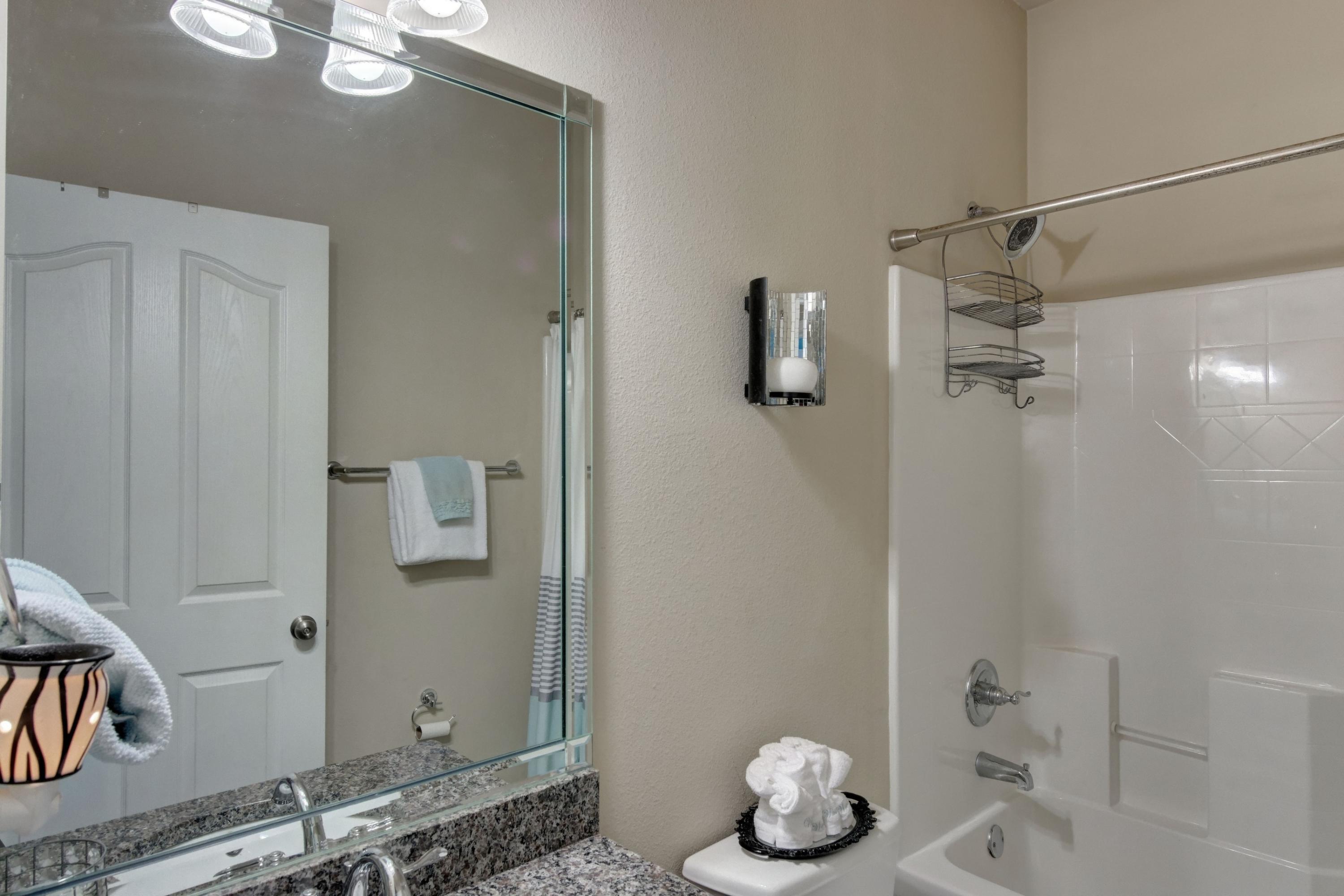 646 Red Fern Road Crestview, FL 32536 - Photo 45 of 64 a bathroom with a bathtub and shower