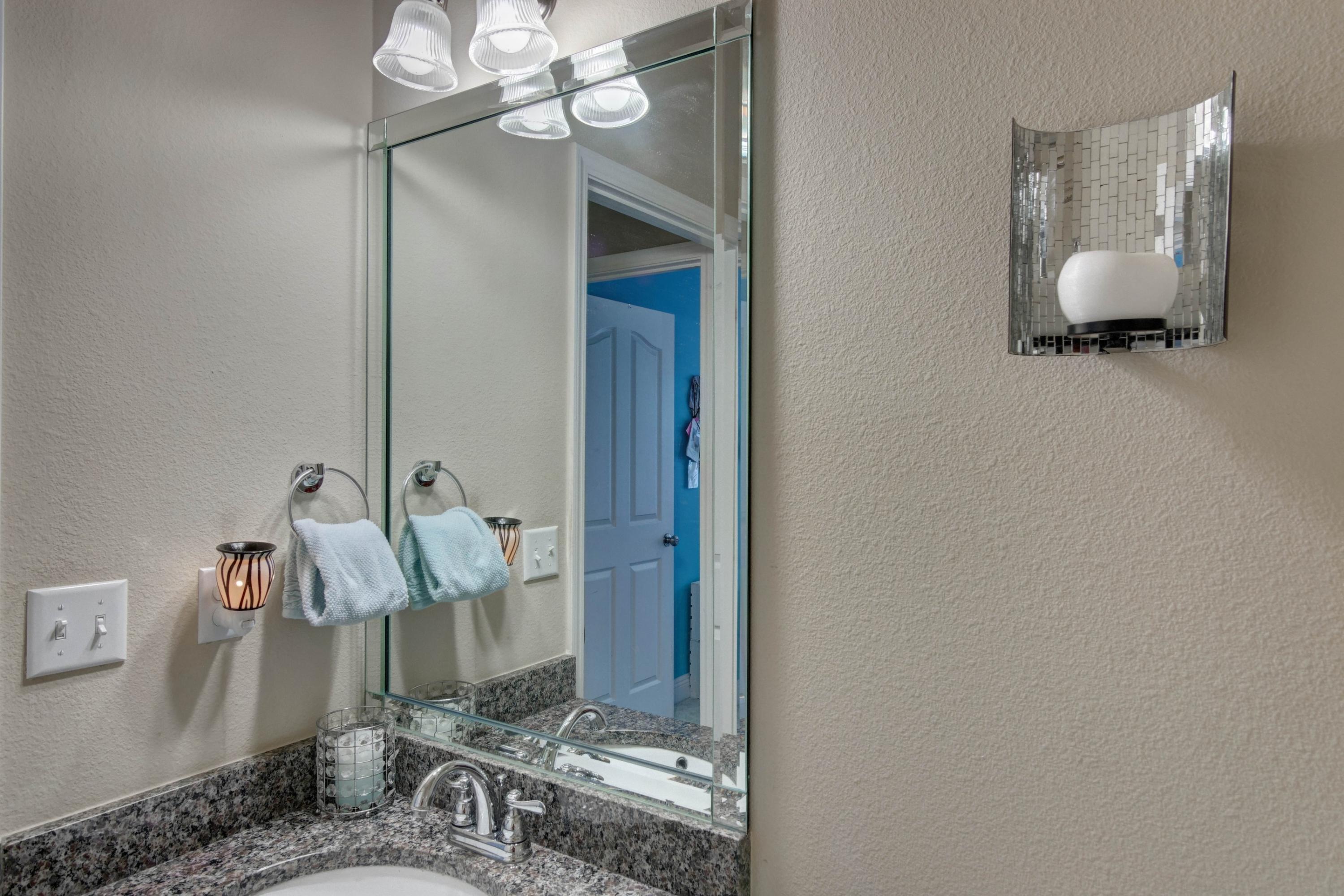 646 Red Fern Road Crestview, FL 32536 - Photo 46 of 64 a bathroom with a sink and a mirror