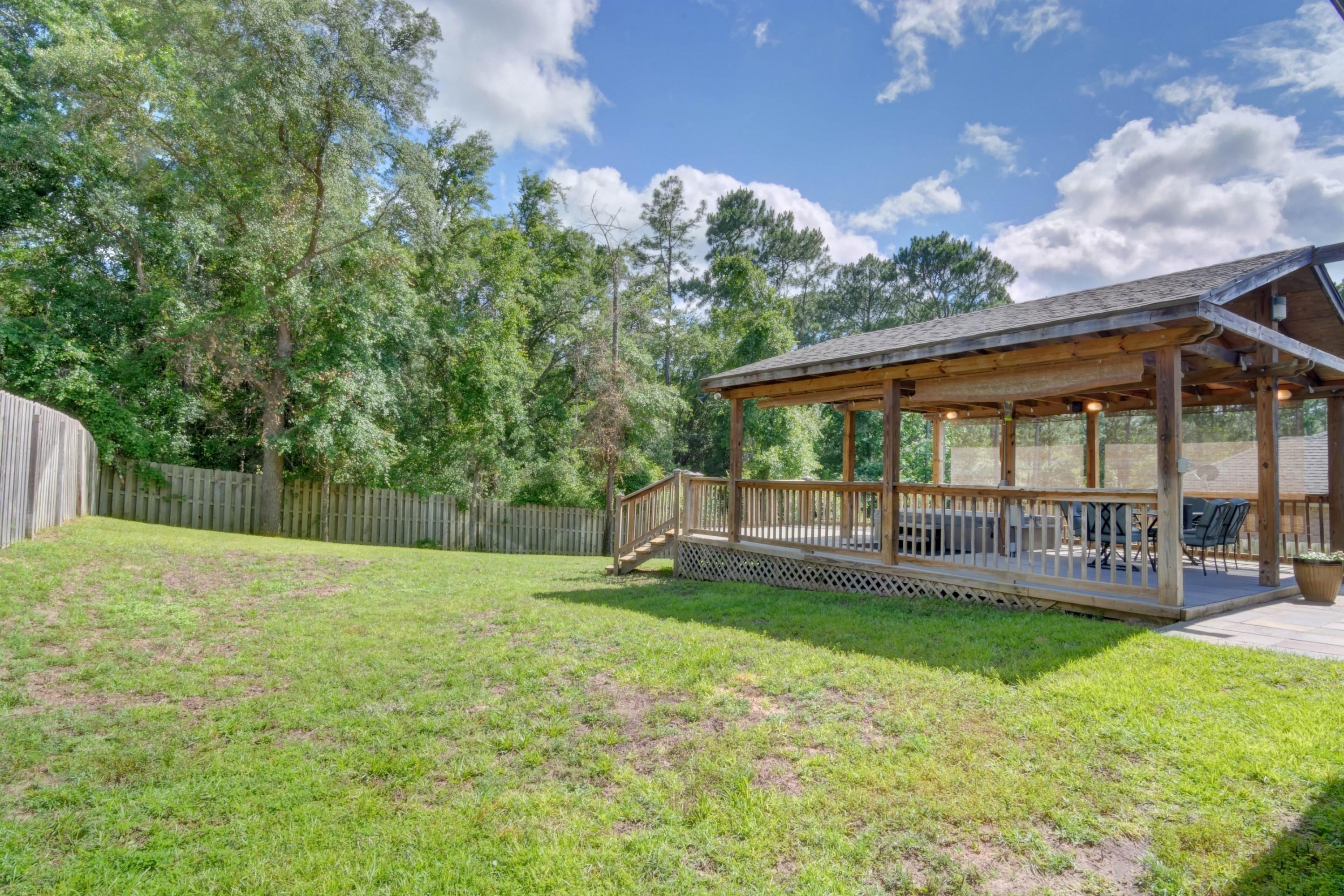 646 Red Fern Road Crestview, FL 32536 - Photo 57 of 64 a view of a house with a yard and sitting area
